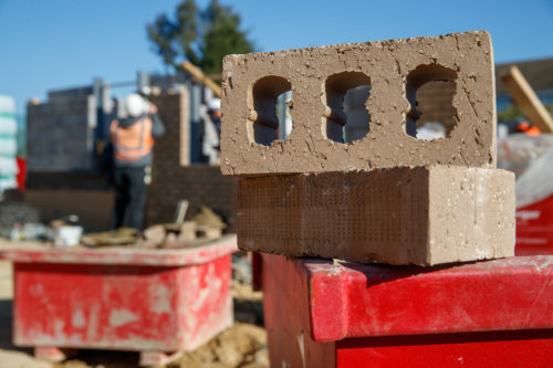 A photo of some bricks at a construction site.